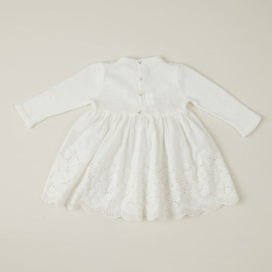 Vista trasera del vestido clavel con lazo y detalles florales