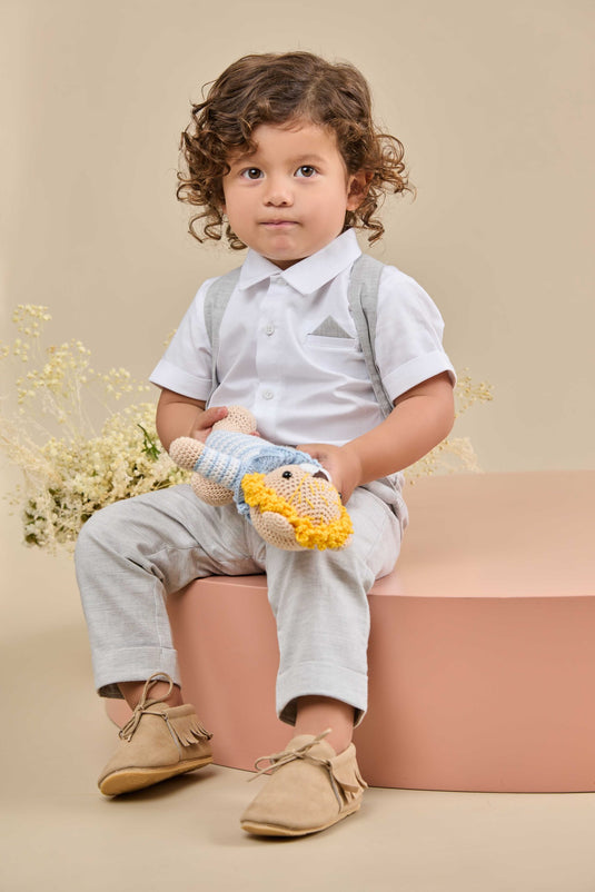 Conjunto infantil de lana con estampado geométrico en tonos beige y marrón