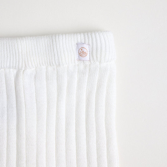 Leggings blancos de bebé con textura acanalada y suave