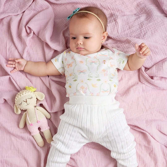 Leggings acanalados blancos para bebé con tejido elástico