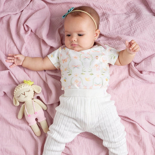 Leggings acanalados blancos para bebé con tejido elástico