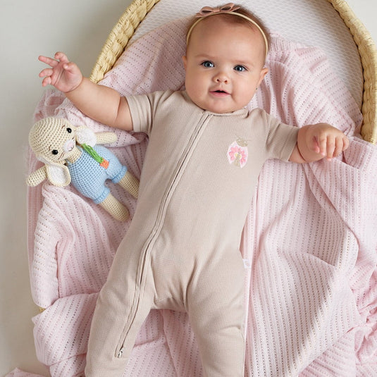 Pijama infantil con divertido estampado de mariquitas rojas