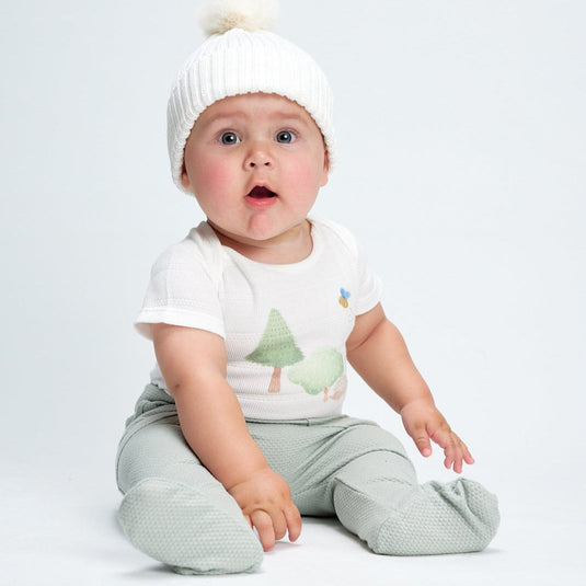 Body con estampado de erizo en tonos tierra y verde menta