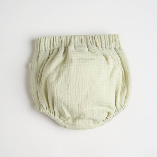 Vista lateral de cubrepañales de oso mostrando su ajuste perfecto