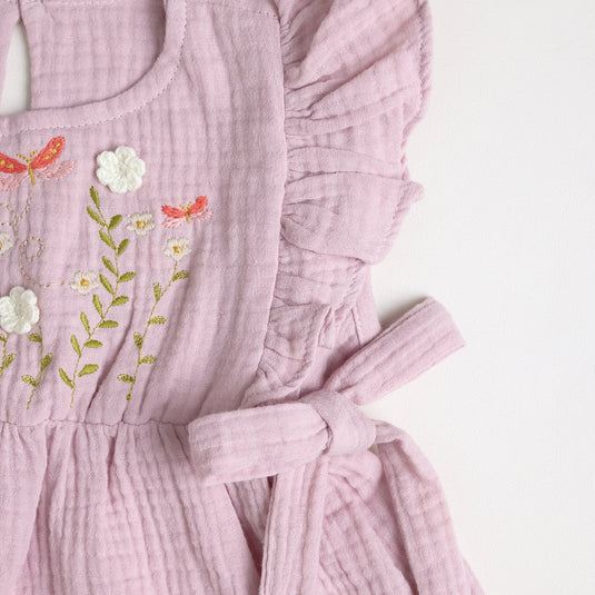 Vista trasera de vestido Saturina con lazo decorativo