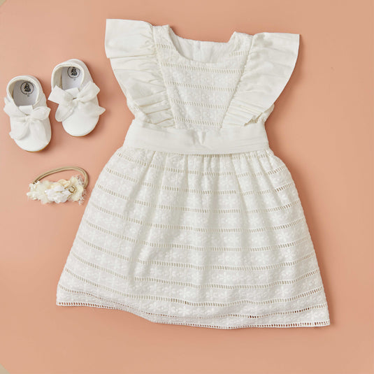 Vestido margarita para niña con estampado floral y mangas cortas