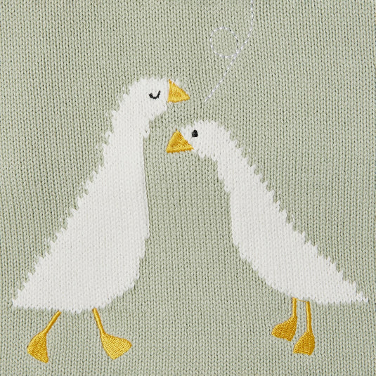 Conjunto de baño infantil con estampado de patitos y gorro a juego